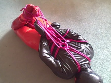 Adreena Hogtied In Rubber